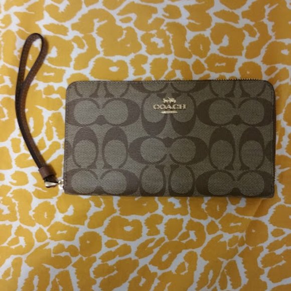 Coach Handbags - NWOT Coach long zip around wallet